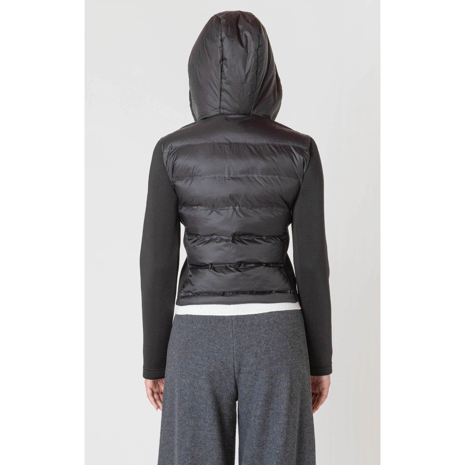 Stay warm this fall in the stylish Room 34 Hooded Puffer Vest, featuring a cozy quilted design and hood.