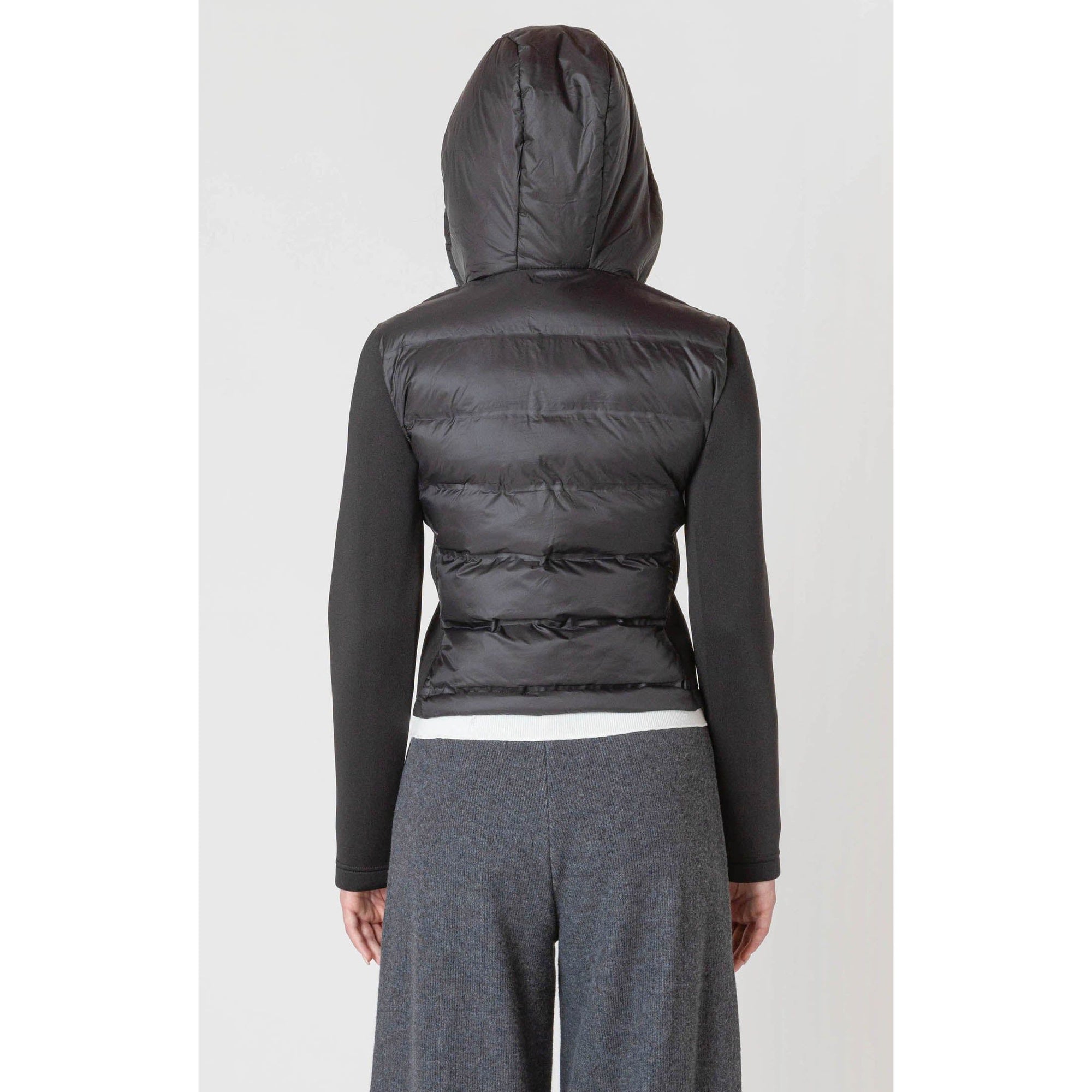 Stay warm this fall in the stylish Room 34 Hooded Puffer Vest, featuring a cozy quilted design and hood.