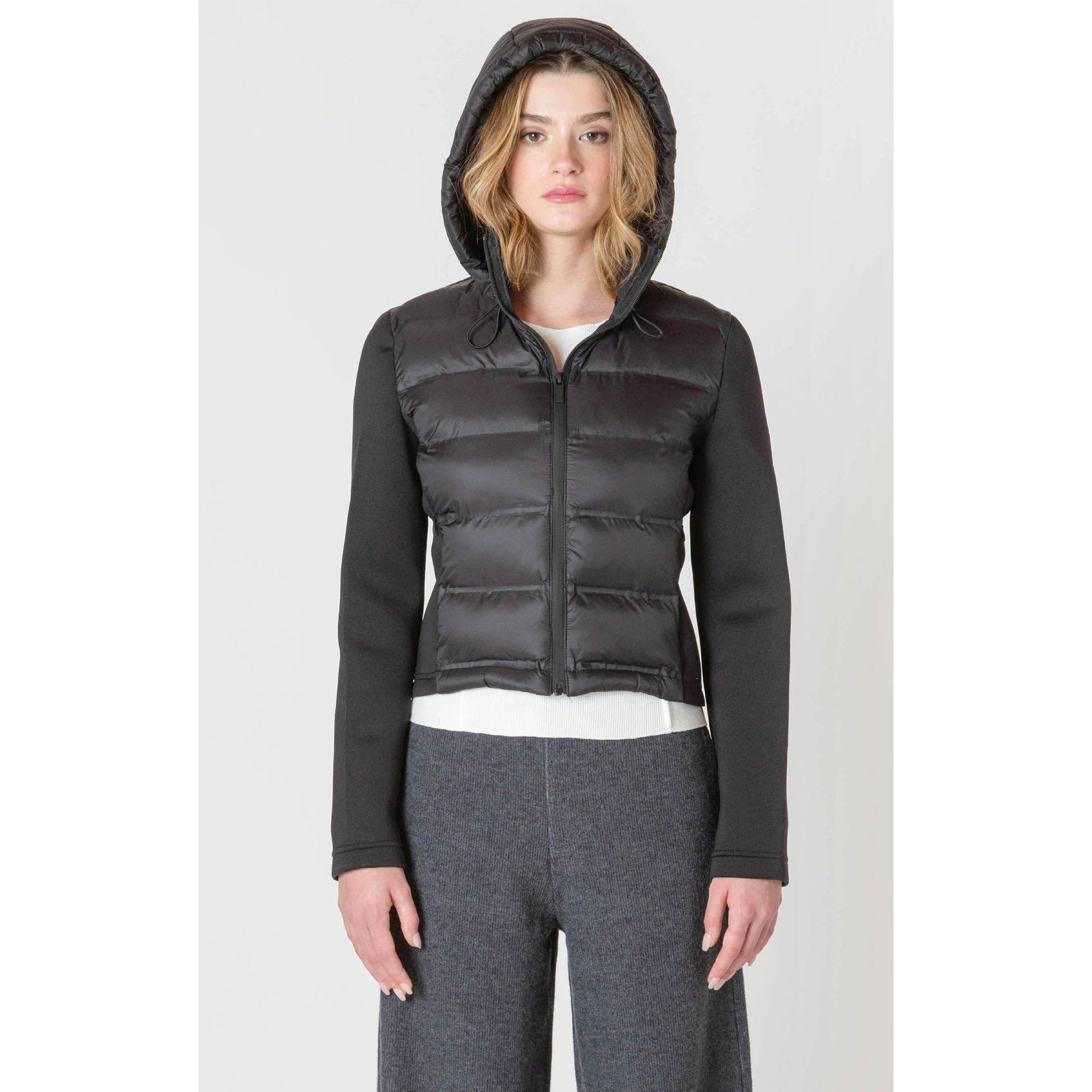 Stay warm this fall in the stylish Room 34 Hooded Puffer Vest, featuring a cozy quilted design and hood.