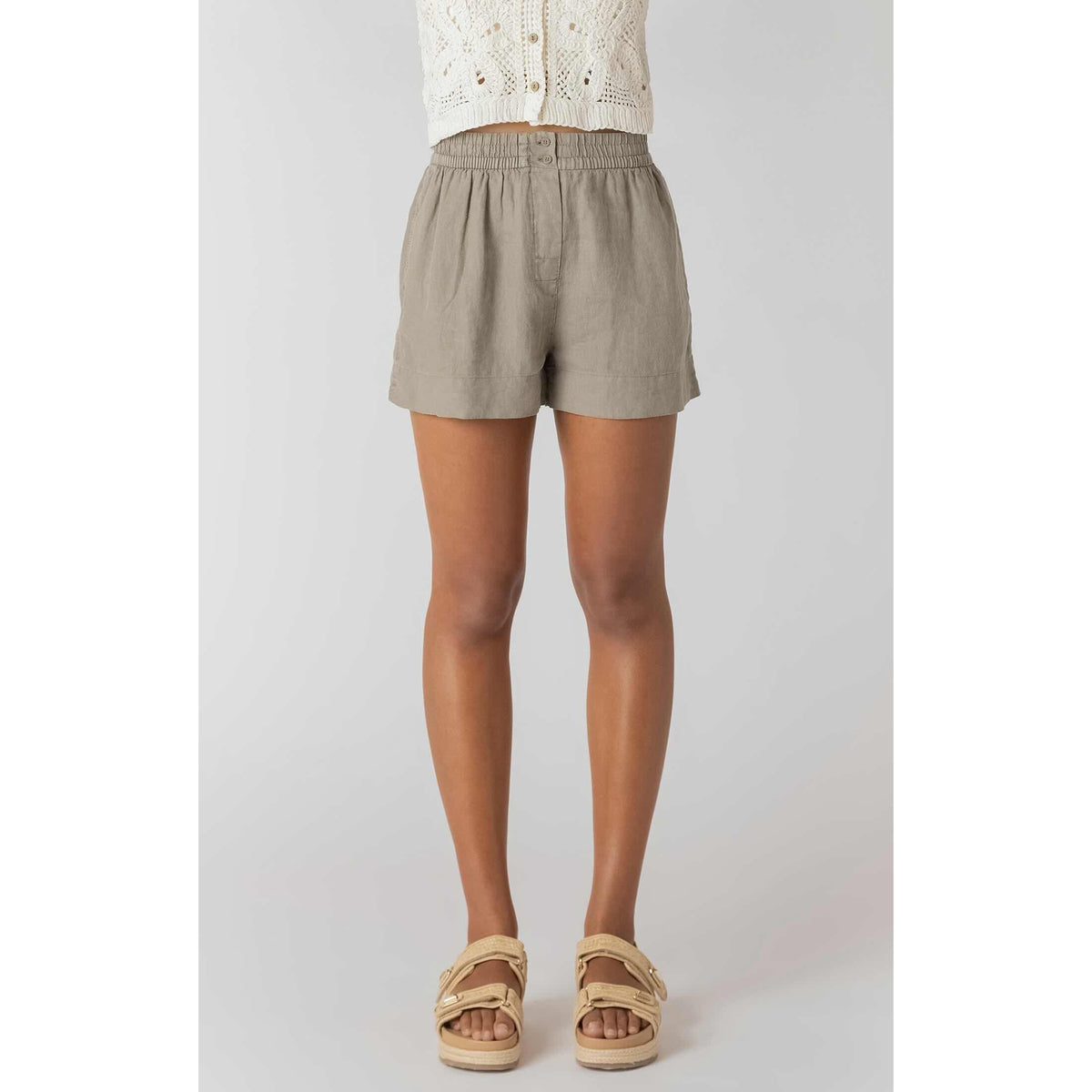 Room 34 Mid-rise Shorts in taupe, woven, mid-rise relaxed fit on model with white top and sandals.