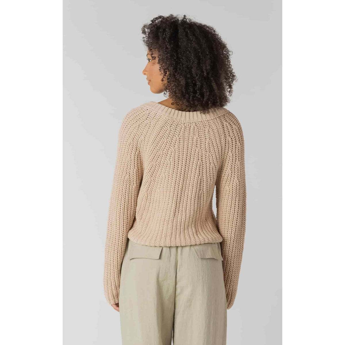 Room 34 Textured Button Front Cardigan on model, back view in beige knit with cropped length and long sleeves.