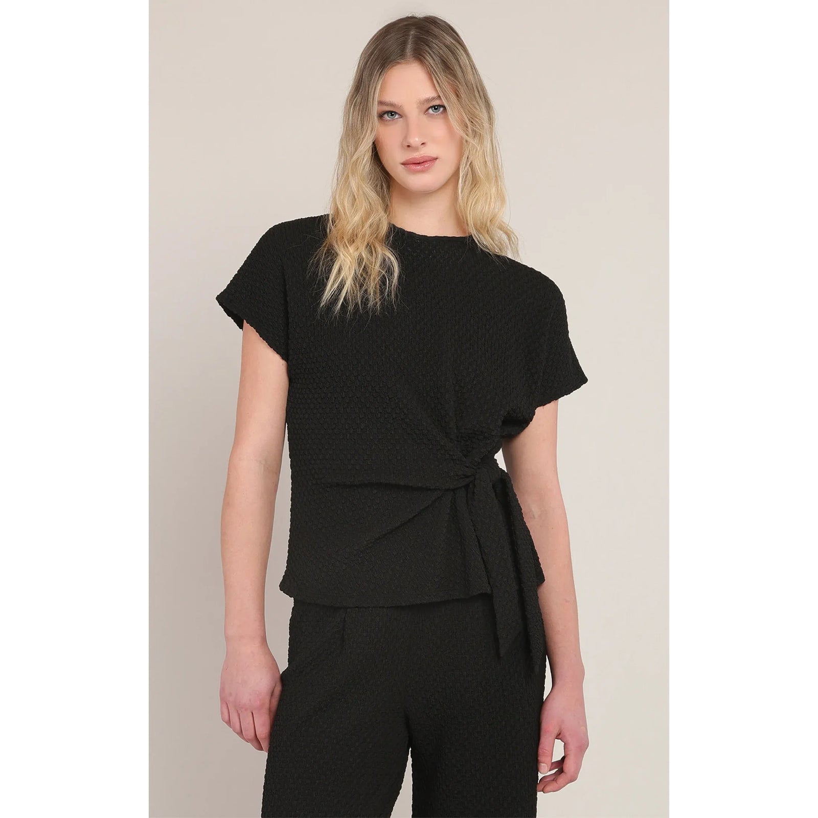 Room 34 Textured Knot Top in black, stretchy textured fabric, wrap-front tie, short sleeves.