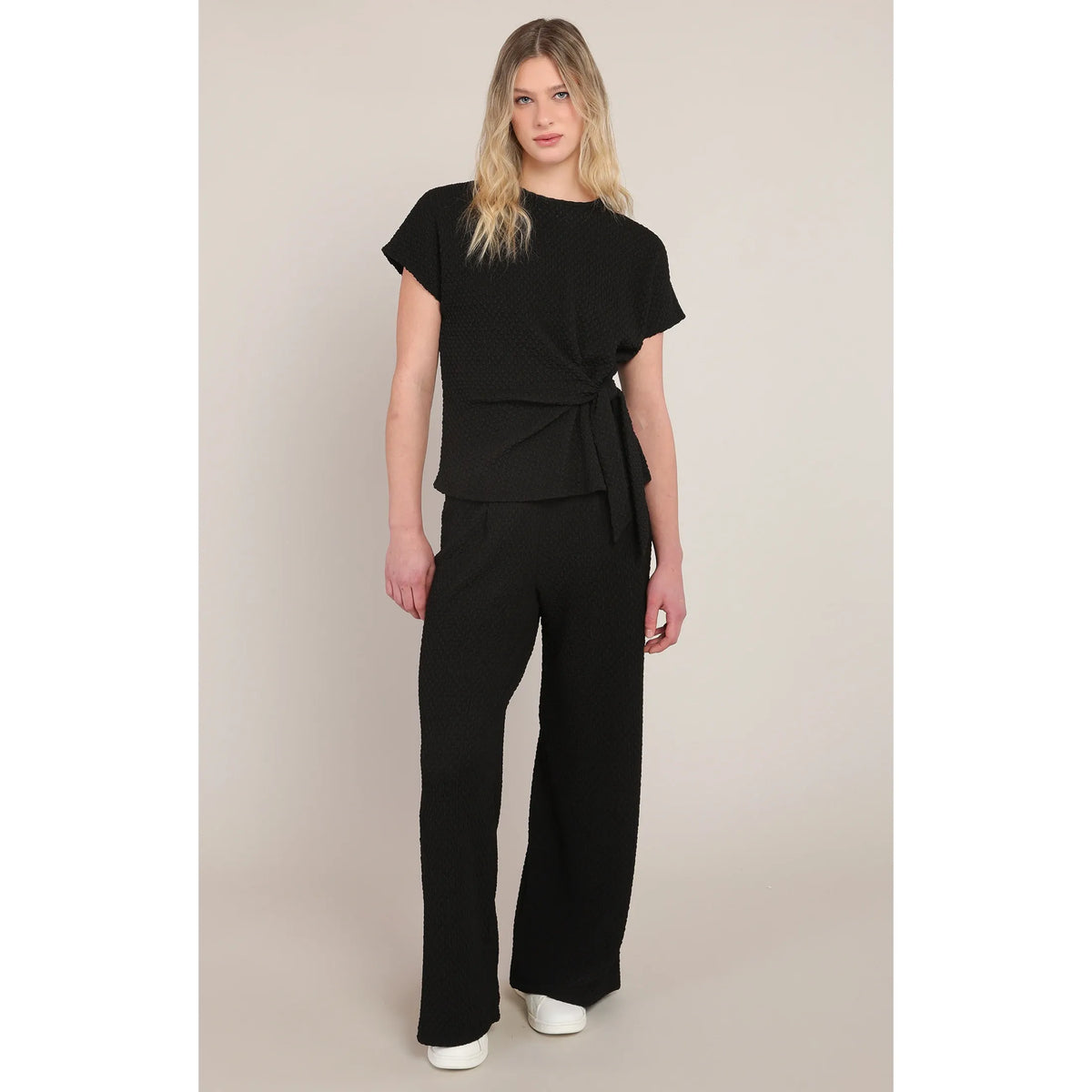 Room 34 Textured Knot Top in black with wrap-front knot, short sleeves, soft stretch textured fabric.