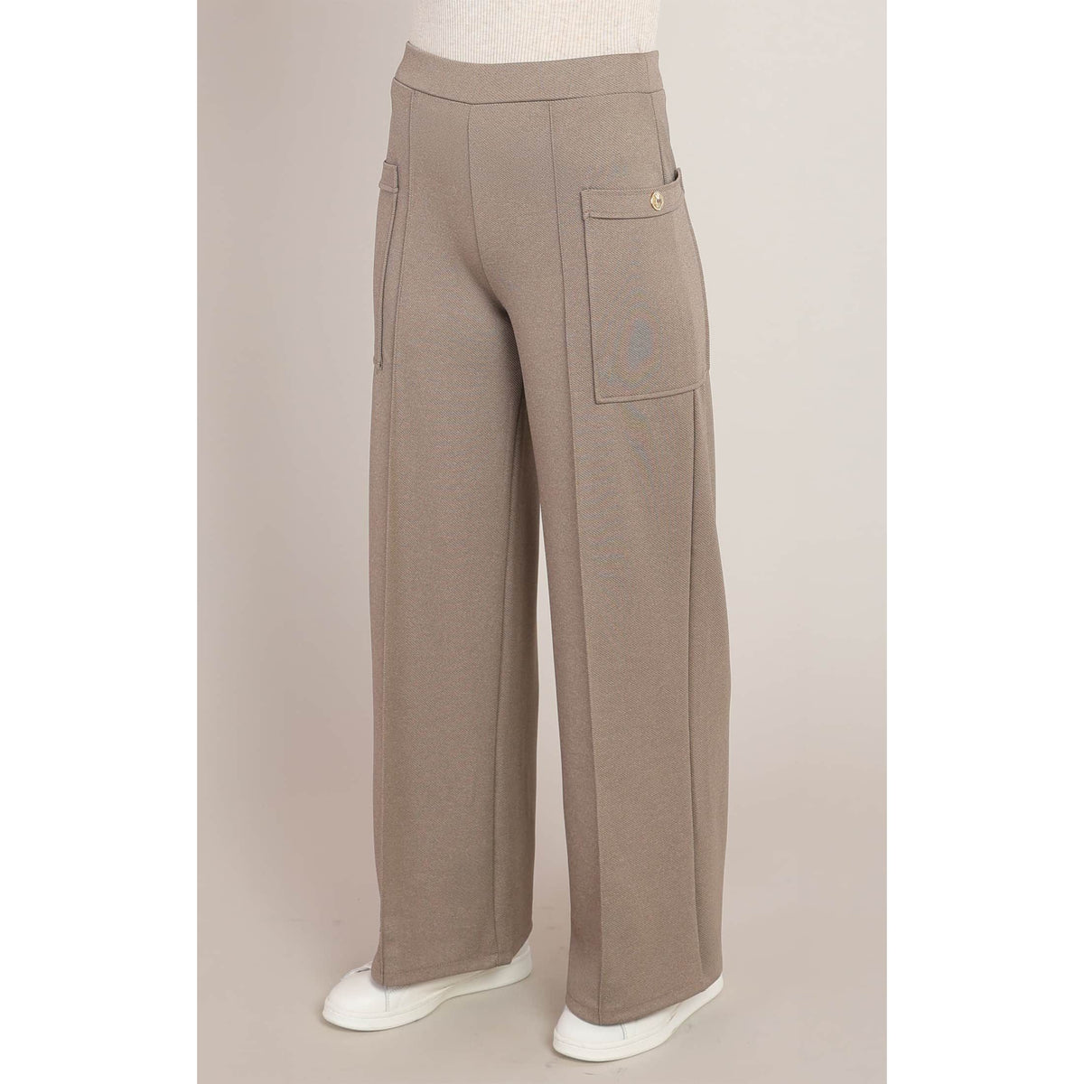 Back view of brown twill cargo pants featuring a relaxed fit, stretch fabric, functional side pockets, and a mid-rise waist.