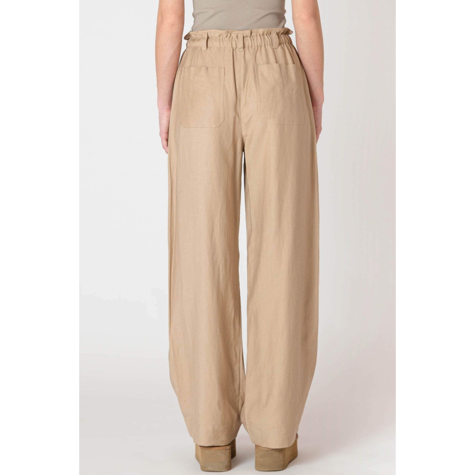 Room 34 Flowy Wide Leg Pants with breezy beige fabric and drawstring waist for chic, relaxed looks.