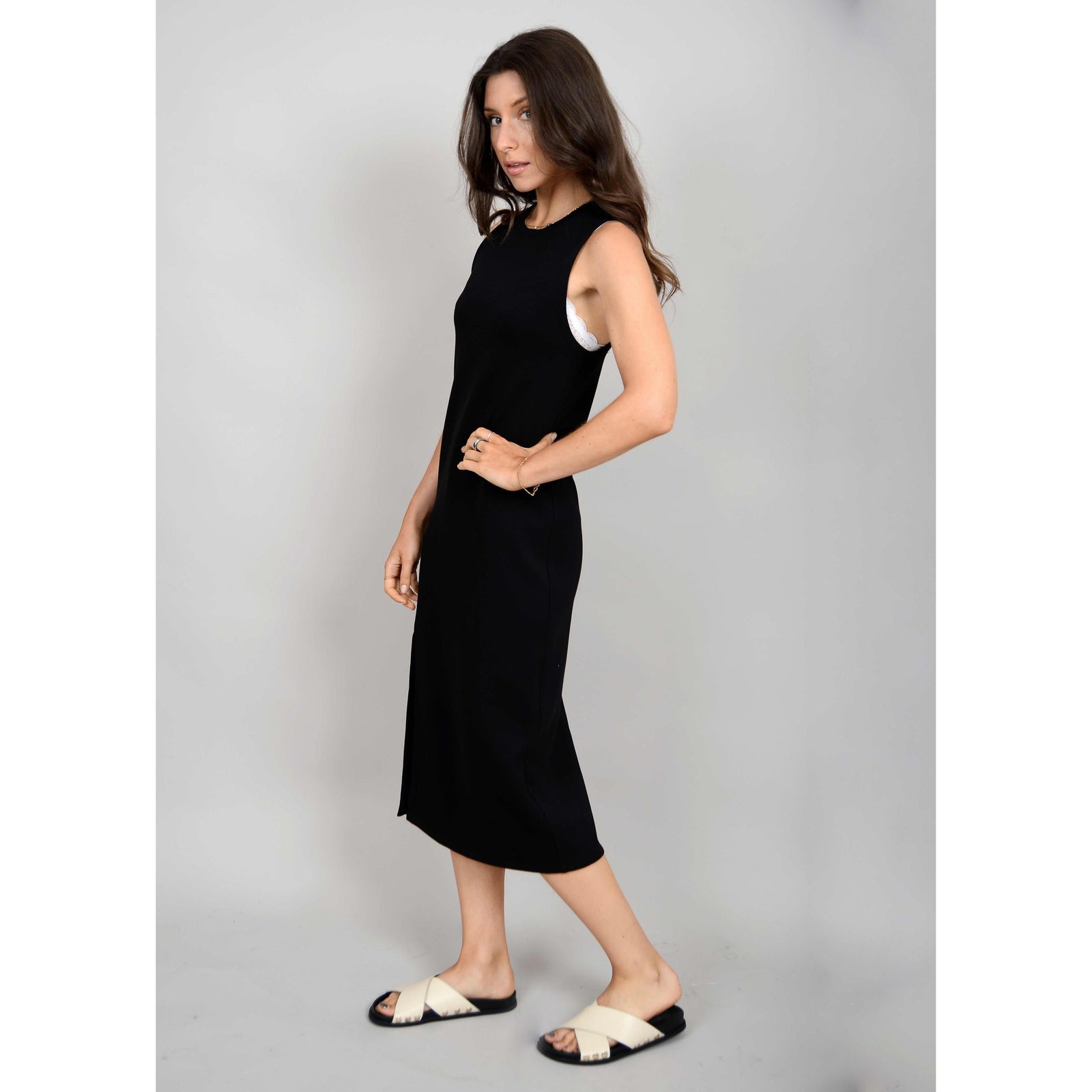 Stylish model showcasing the Scuba Adina Soft Knit Sleeveless Dress, perfect for summer adventures in comfort.