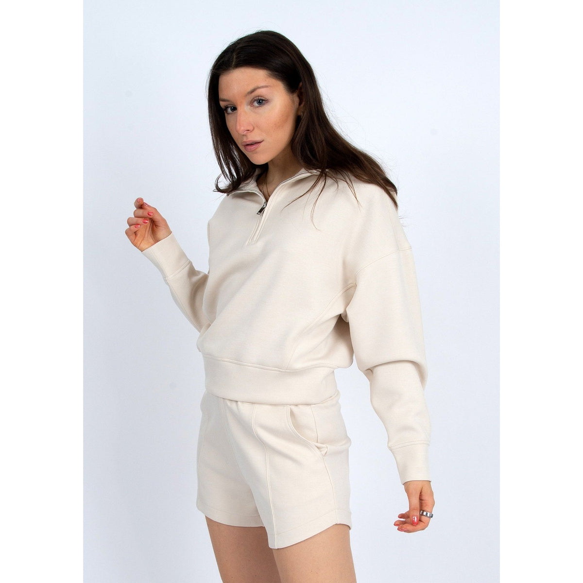 Stylish Mailyn Soft Scuba 1/2 Zip Pull Over in cream, perfect for cozy comfort and trendy outfits.