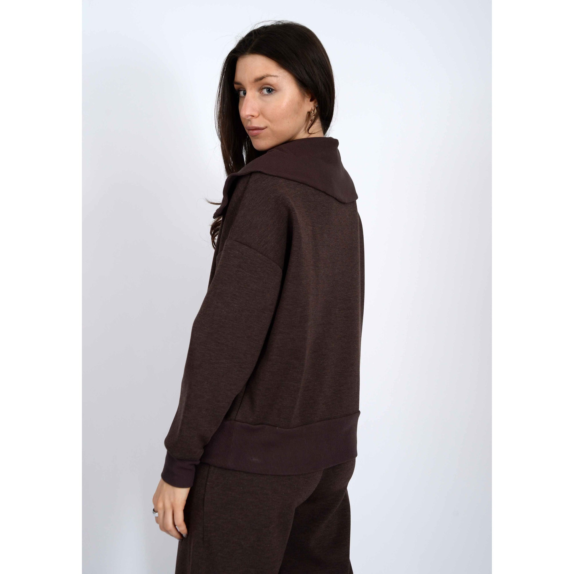 Scuba Sean Soft Knit Half Zip Pullover in umber worn by a model, cozy brown knit hoodie.