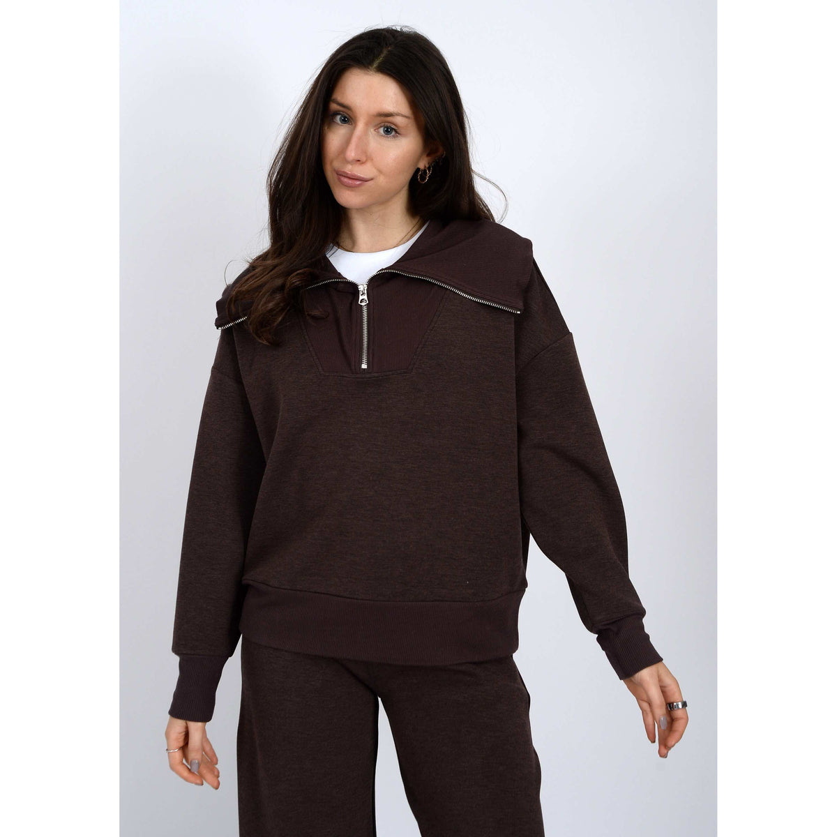 Model in dark brown soft-knit half-zip pullover from Scuba Sean; Prida Soft Knit Pull-On Drawstring Pant styling.