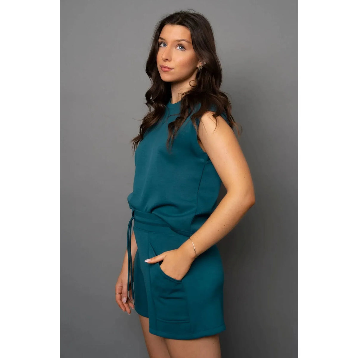 Scuba Senza Soft Knit Shorts set in trekking green with pockets for a teal lounge look.