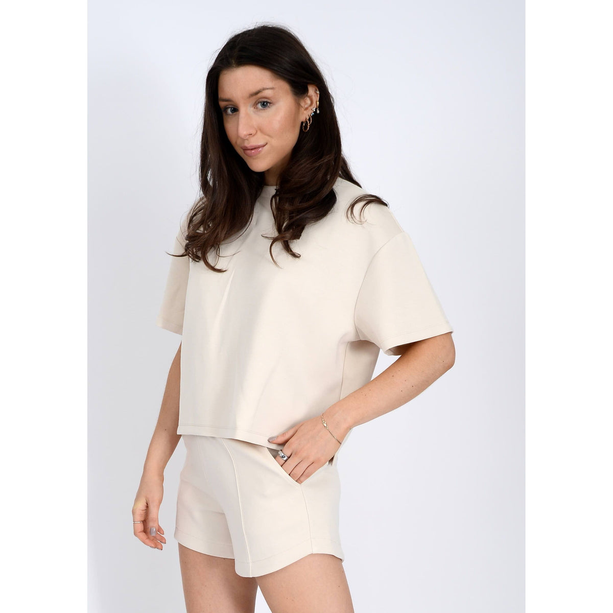 Scuba Tess Soft Knit Top in cream, featuring a boxy fit, perfect for casual styling with shorts or denim.