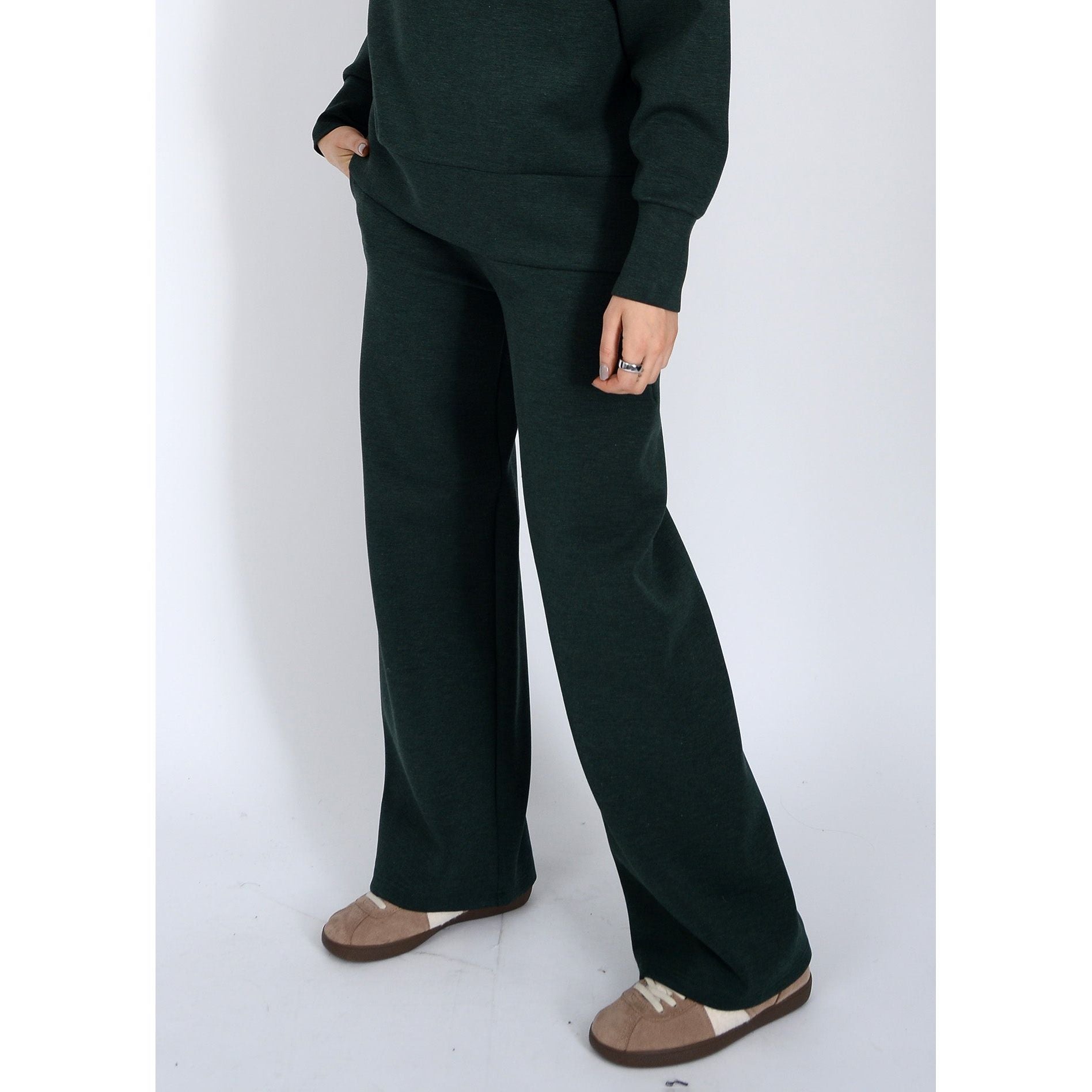 Prida Soft Knit Pull-On Drawstring Pant in dark green knit, wide-leg style with adjustable waist.