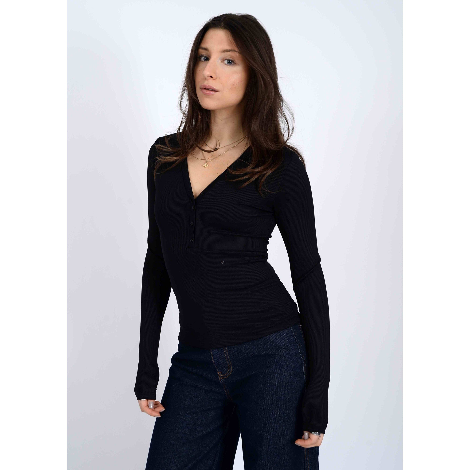 Second Skin Helane 23 2x2 Rib Henley in black worn by model, snug 2x2 rib knit top.