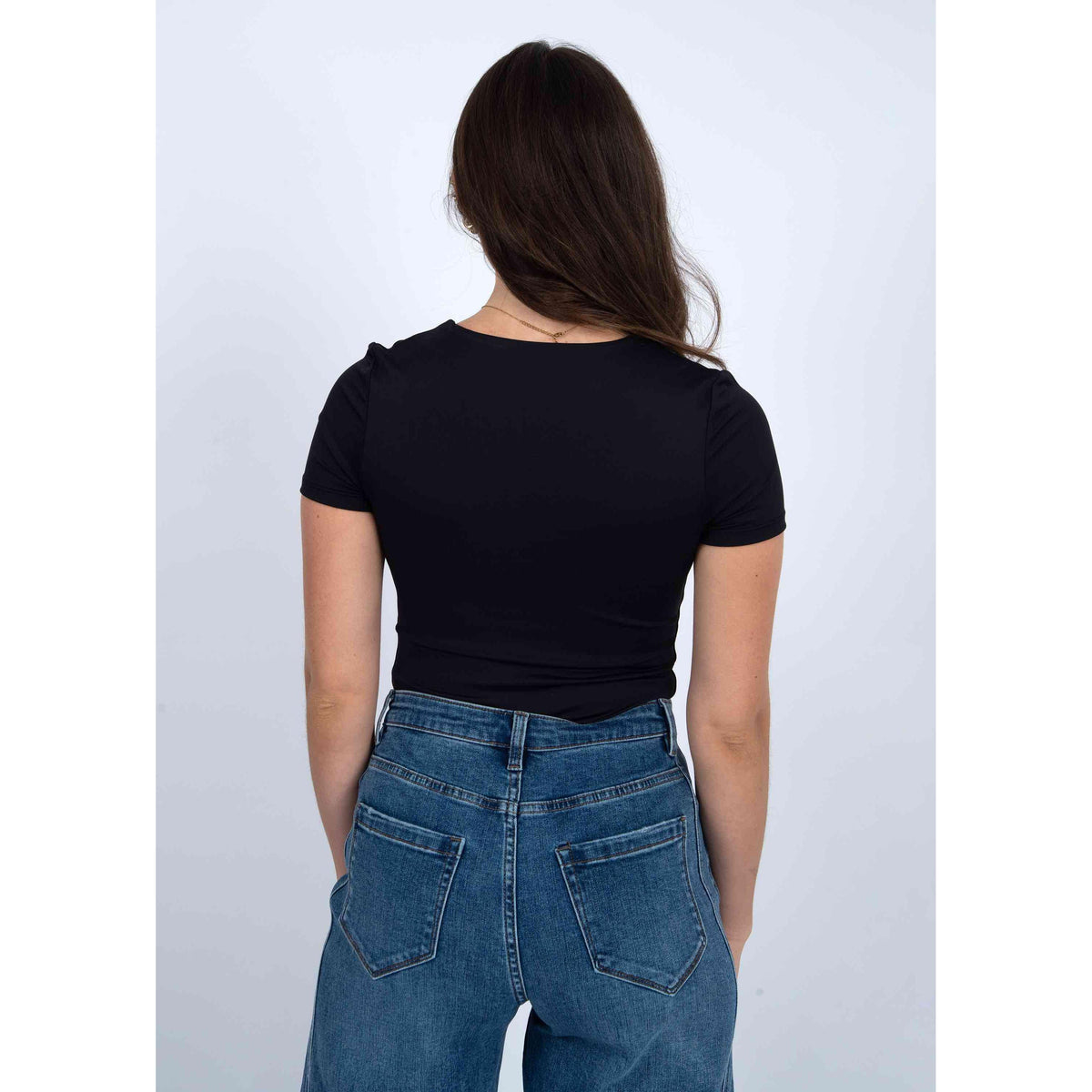 The Second Skin Sue Scoop Cap Sleeve Body Suit by RD Style offers a sleek, comfortable fit, perfect for any outfit.