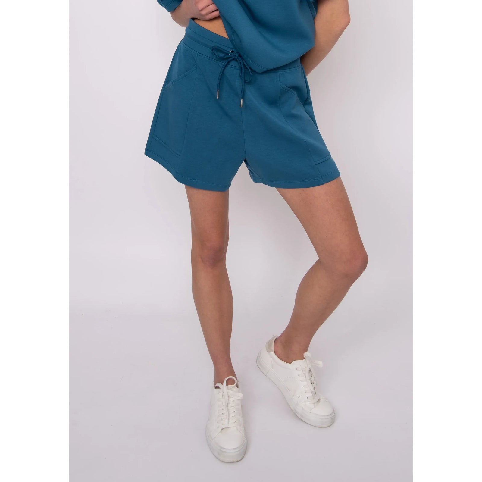 Senza Soft Knit Shorts in teal with drawstring and pockets, paired with a matching top.