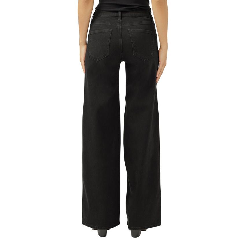 Back view of a model wearing Silver Suki Wide Leg Black jeans in Luxe Stretch denim, mid-rise, contoured fit.