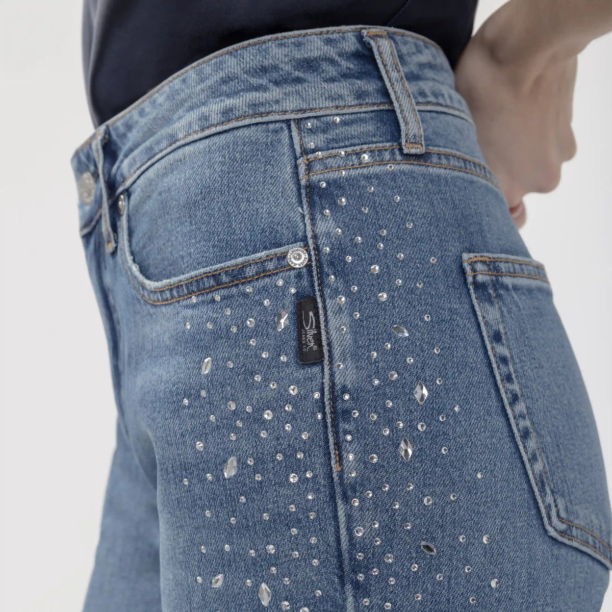 Silver Avery Wildcard trouser back pocket features scattered crystal rhinestone embellishments and a contoured high-rise waistband.