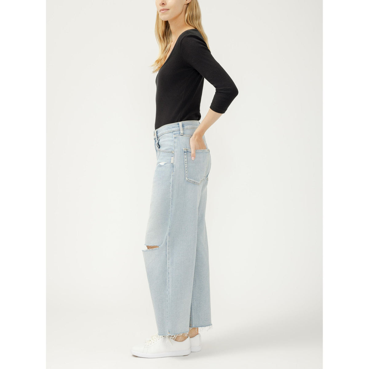 Silver Be Easy Wide Leg Crop in Malaga jeans with high-rise, light-wash, cropped wide-leg style on model in black top