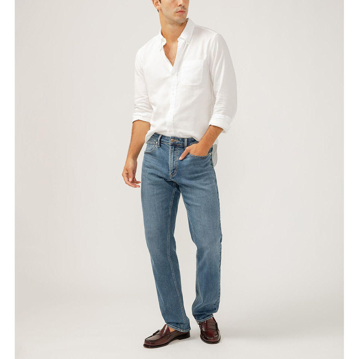 Silver Grayson Straight Denim from Silver Label with a classic fit and 17" straight leg silhouette.