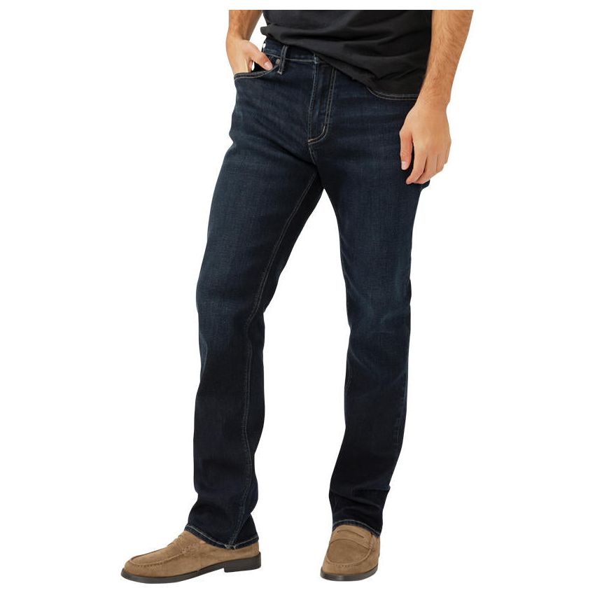 Stylish man wearing Silver Grayson Straight in Radio Denim, featuring a comfortable fit and sleek 17" straight leg.