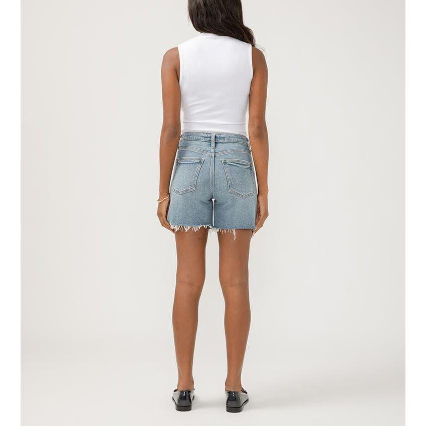 Stylish back view of Silver Highly Desirable Long Shorts from Silver Jeans Co.™, featuring a flattering fit in indigo wash.