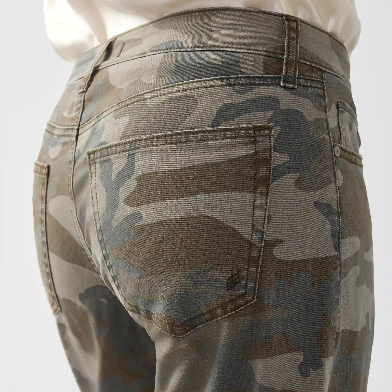 Back view of silver loose low camo jeans featuring a contoured waistband and classic pockets with detailed stitching.
