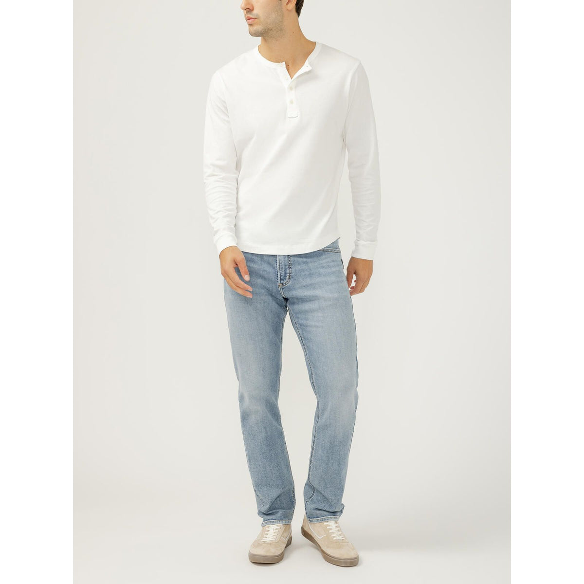 Silver Machray Slim Straight Leg jeans in Wild wash on male model in white long-sleeve tee