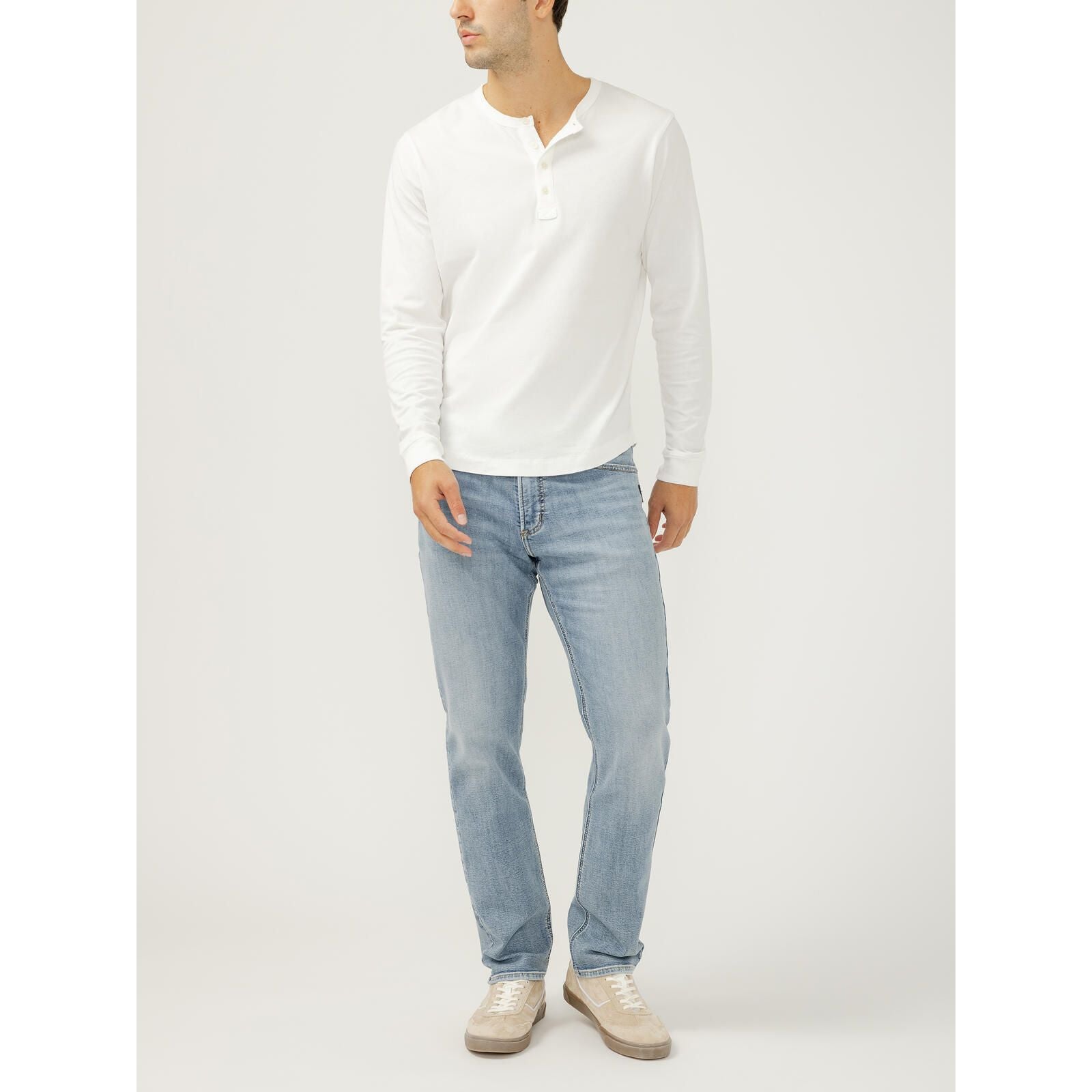 Silver Machray Slim Straight Leg jeans in Wild wash on male model in white long-sleeve tee