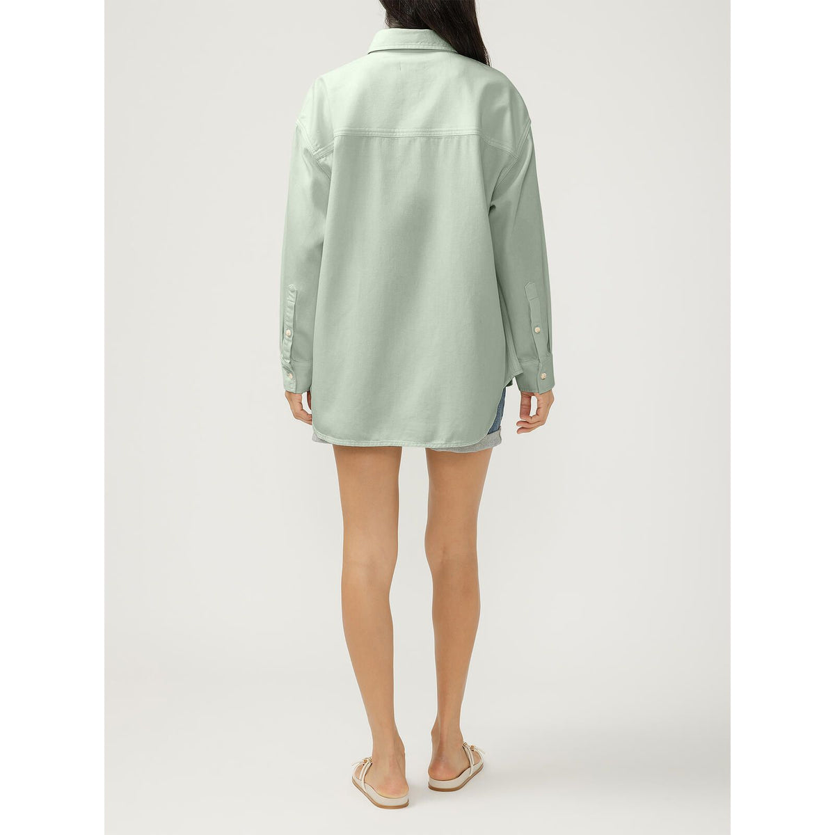 Back view of Silver Relaxed Fit Beach Shirt in pale denim, oversized with long sleeves and button cuffs.