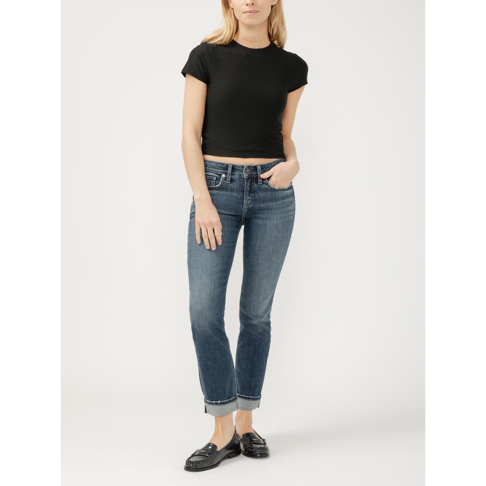 Model wearing Silver Suki Straight Leg jeans in Isles Denim with tee and rolled cuffs.