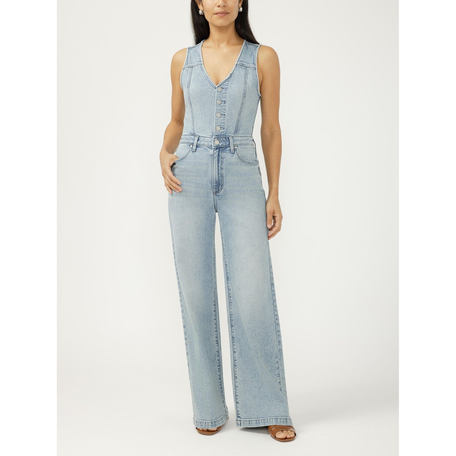 Silver wide-leg denim vest jumpsuit with button-front closure and structured seaming in Holbox.