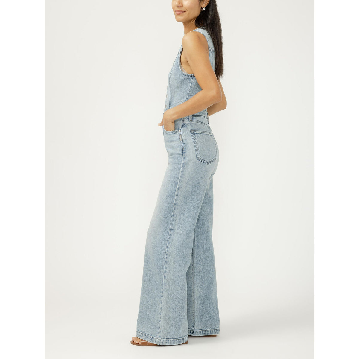 Silver wide-leg vest jumpsuit in Holbox; denim, vest silhouette, button-front closure, and wide legs.