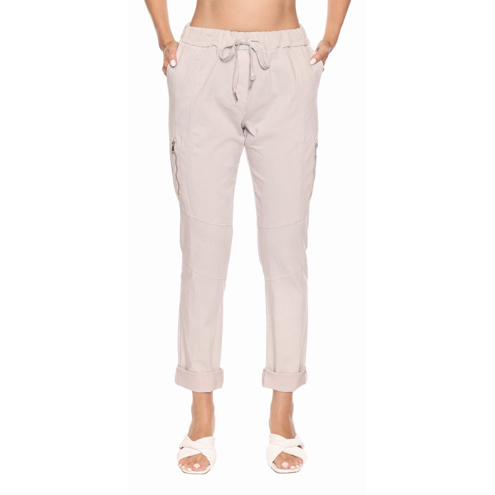 Sorella Pant with Zipper Detail Sand: beige joggers with drawstring waist, zip pockets, and rolled cuffs.