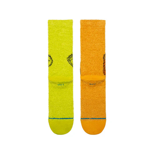 Stance Grinch & Max Crew Socks in neon lime and orange, featuring cushioned sole and seamless toe.