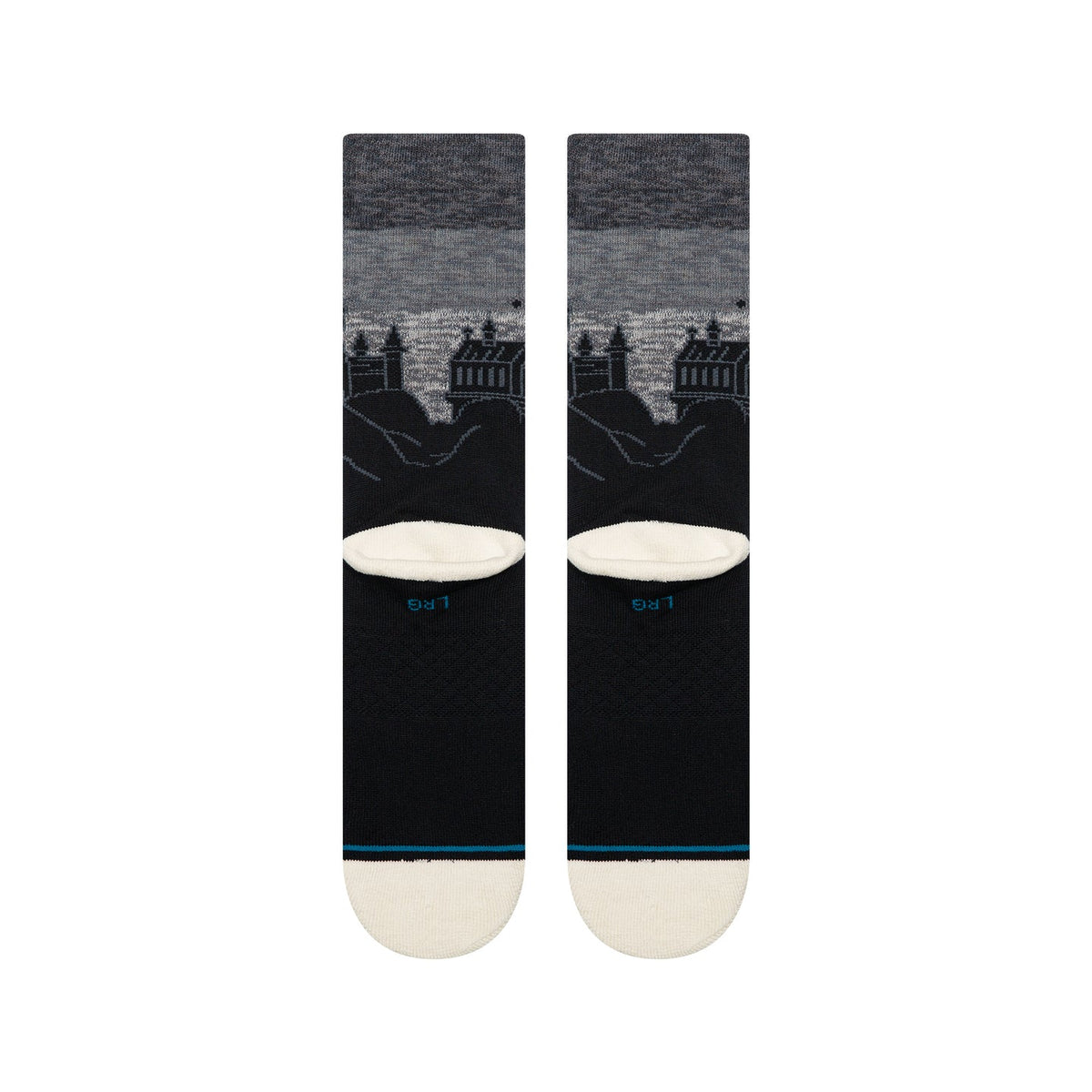 Black crew socks featuring a grey night sky and silhouetted Hogwarts Castle towers. Includes medium cushioning and cream toe.
