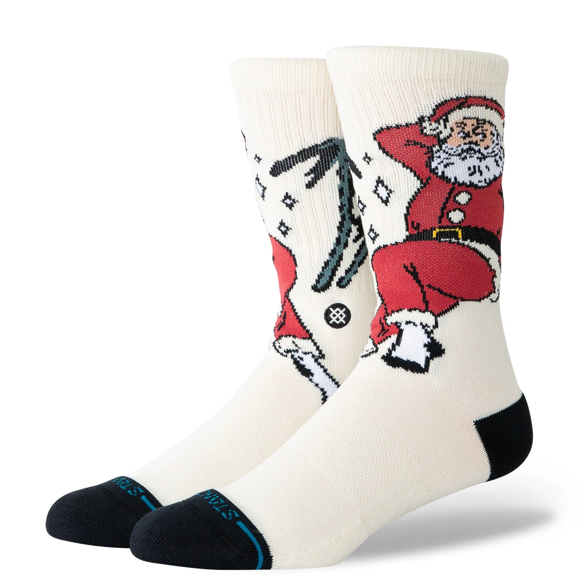 Cream Stance crew socks featuring Santa relaxing on a beach chair. Holiday socks with black toe and heel accents.