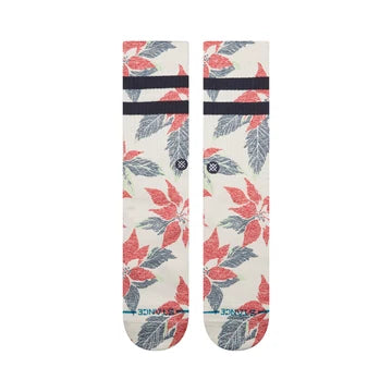Cream crew socks featuring a bold red and grey poinsettia holiday pattern with navy elasticbands and Stance branding near the ankle.