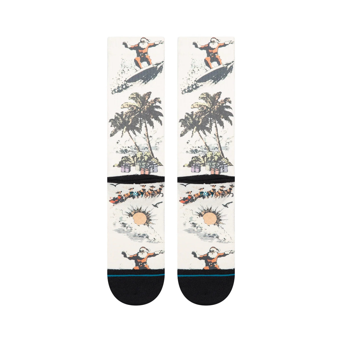 Cream crew socks featuring a surfing Santa, palm trees, and reindeer sleigh graphic with black cuffs and toe caps.