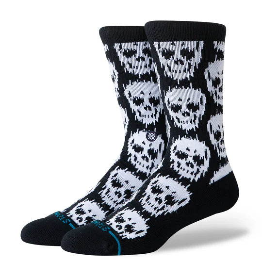 Stance Static Skull Crew Socks: black crew socks with white skull pattern, seamless toe and cushioned, stay-put fit.
