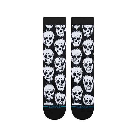 Stance Static Skull Crew Socks with all-over white skulls on black, crew length, seamless toe, cushioned, stay-put fit.