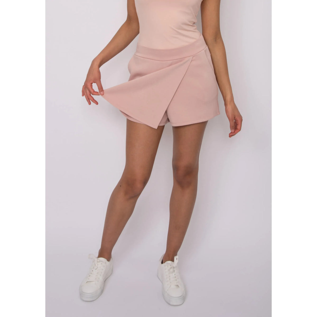 Starry Soft Knit Skort in blush pink with wrap overlay, casual summer look.