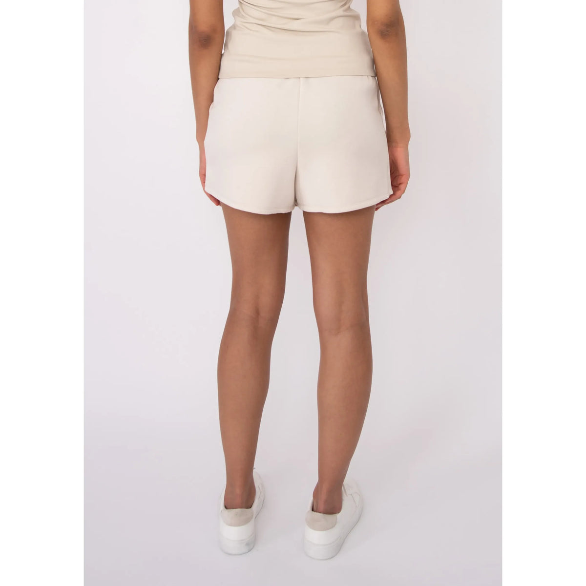Starry Soft Knit Skort in cream, back view showing soft knit fabric and relaxed summer fit.
