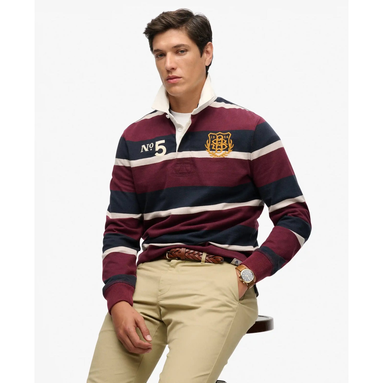Superdry Double Emblem Rugby Shirt with maroon, navy and cream stripes and crest embroidery.