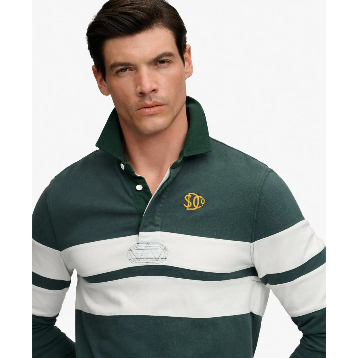 Superdry Vintage Athletic Stripe Rugby Top in dark green with white stripe and embroidered chest logo.