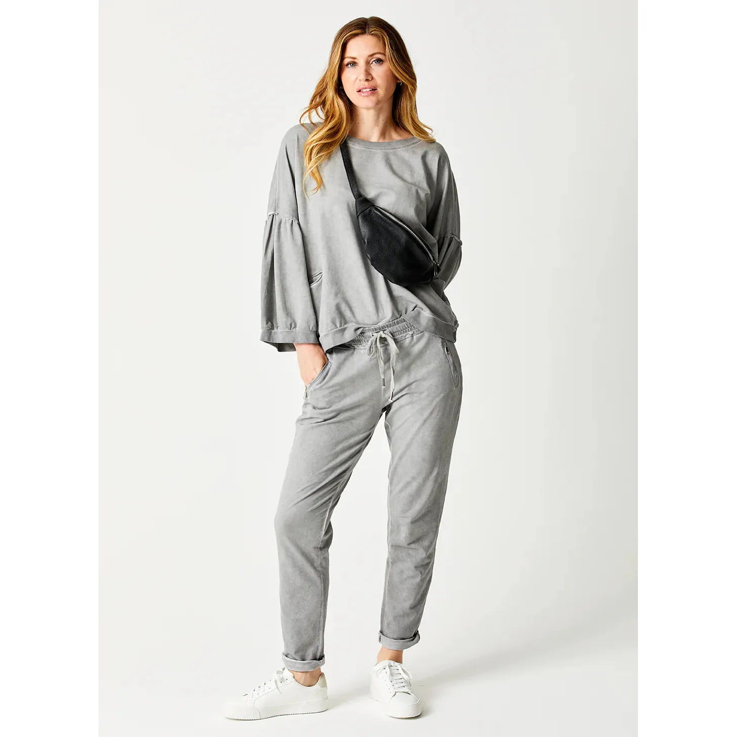 Chic and comfy, the Suzy D Bailey Vintage Wash Side Zip Jogger features stylish zipped pockets and a drawstring waistband.