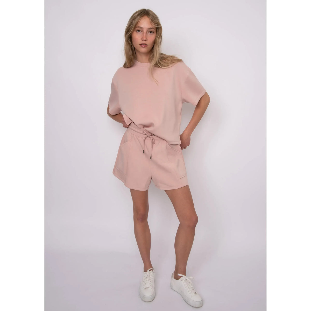 Tess Soft Knit Top in blush pink, boxy relaxed fit paired with matching shorts on model.