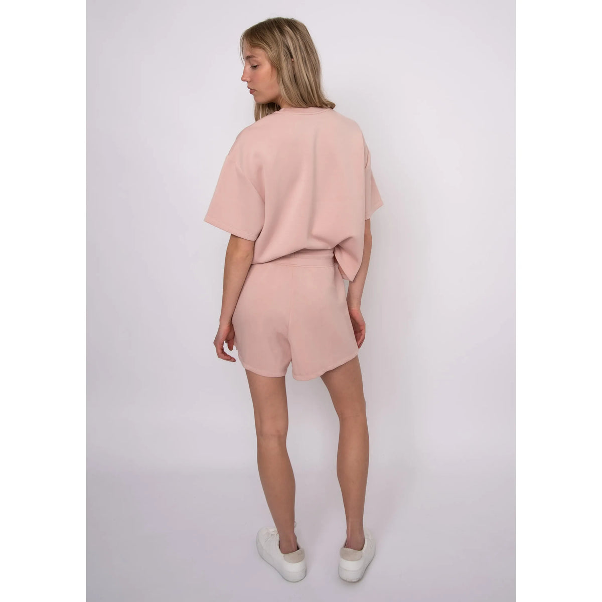 Tess Soft Knit Top in blush pink with matching shorts; boxy fit on model size Small.