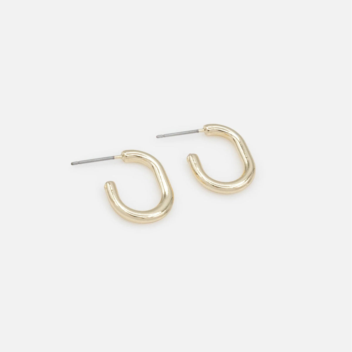 Tiny gold hoop earrings with a smooth curved design and hypoallergenic metal.