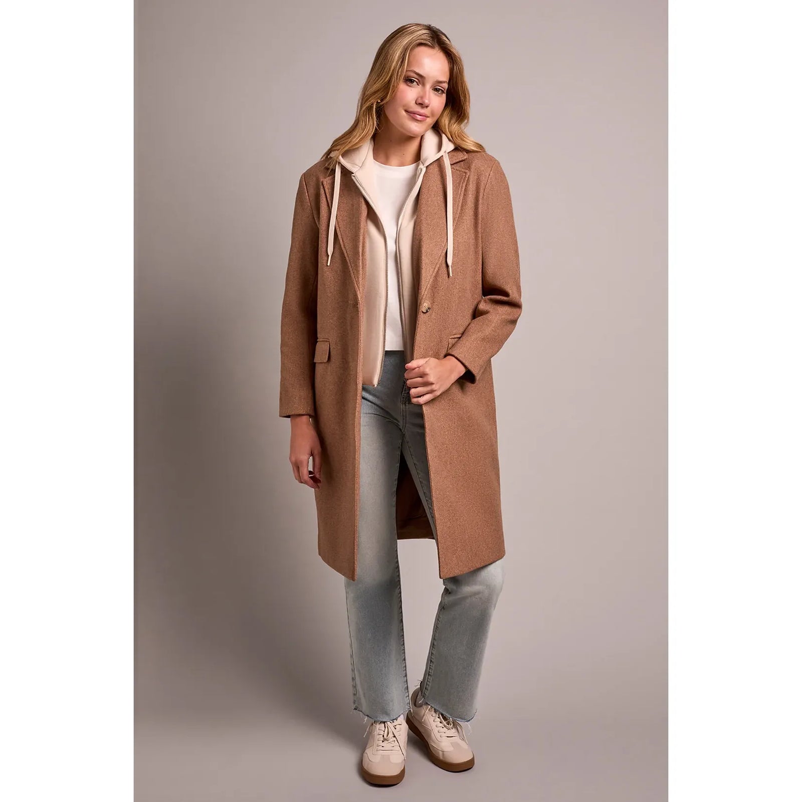 Brown tribal knit car coat with notch lapels and removable fooler hoodie insert for versatile casual layering.