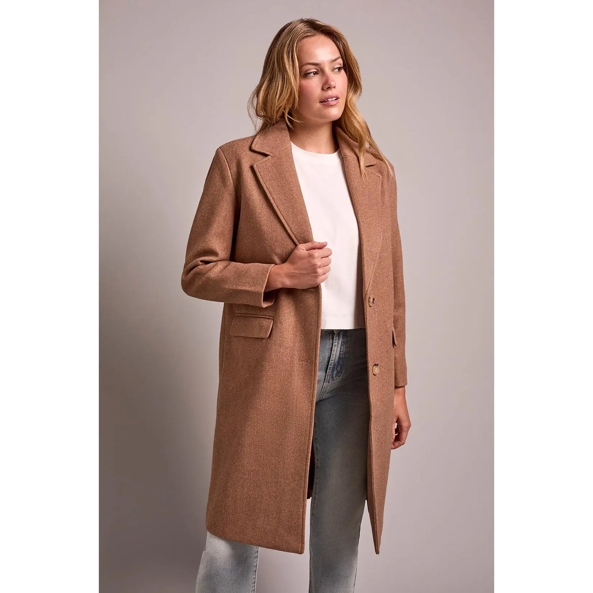 Tribal knit car coat in camel with notch lapels, button front, and side pockets. Features a removable hoodie insert for versatile casual styling.